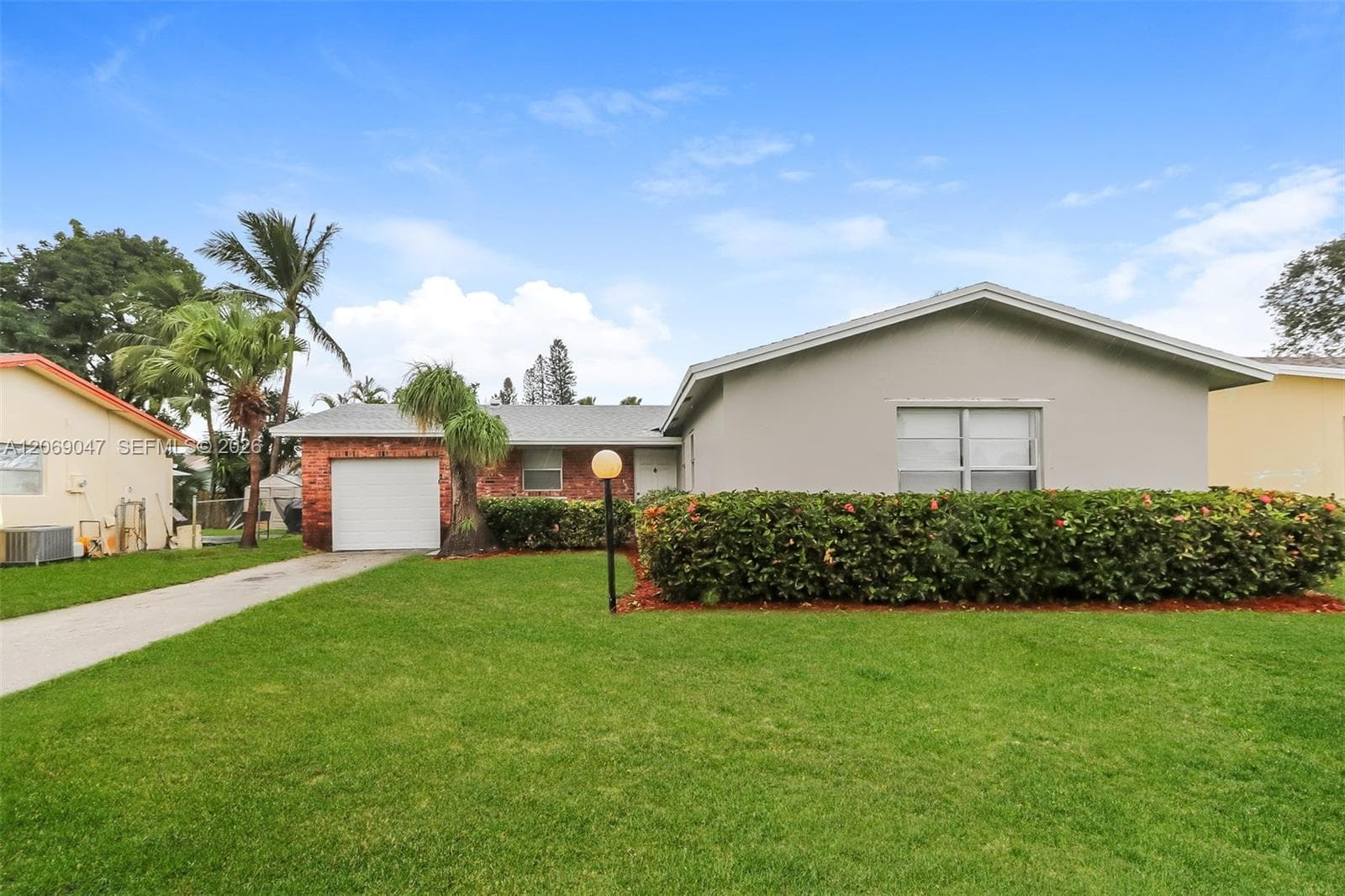 9749 Sandalfoot Blvd, Boca Raton FL 33428