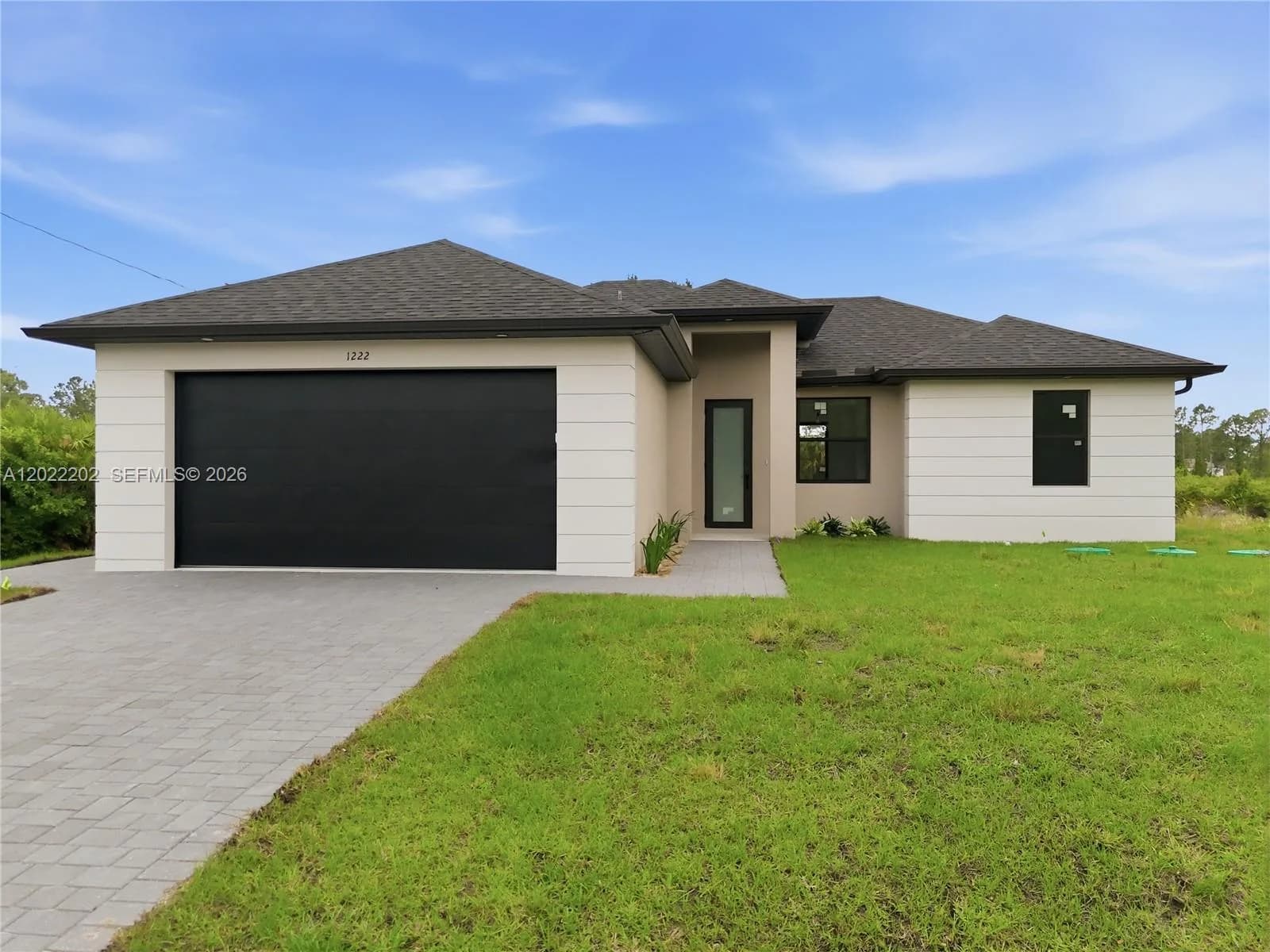 1222 Earnest St E, Lehigh Acres FL 33974