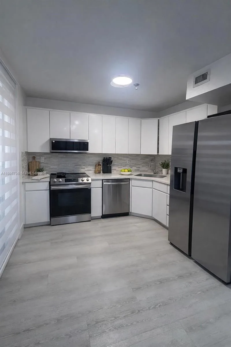 671 NE 195th St # 219-E, Miami, FL 33179