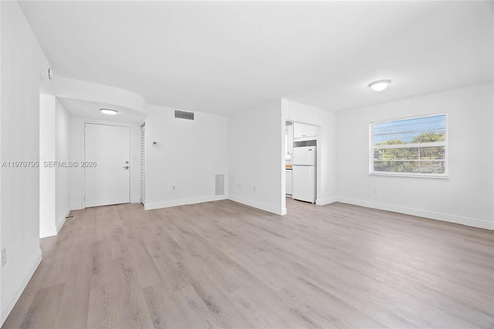4990 E Sabal Palm Blvd # 202, Tamarac FL 33319